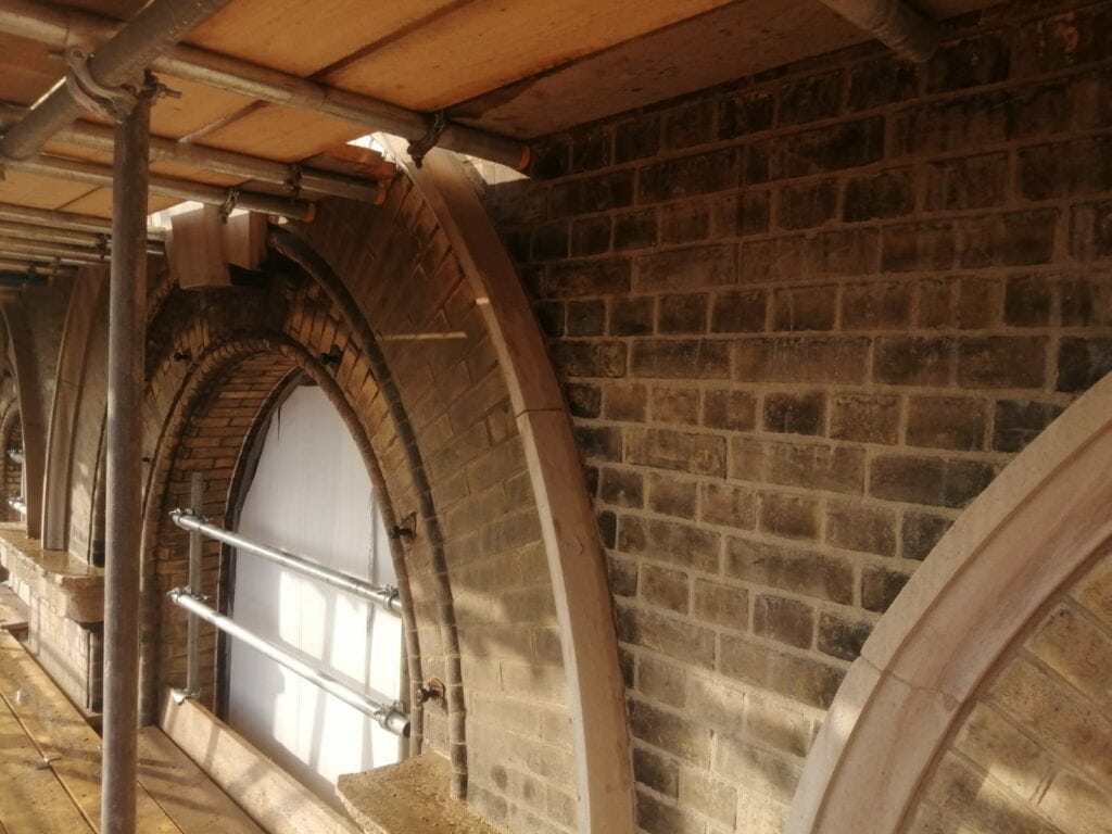 Carbon stain removal from bricks